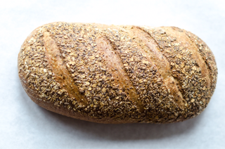 Basket risen, hearth baked multigrain loaf utilizing regionally grown and milled flour and grains. From our friends @ODBBakery